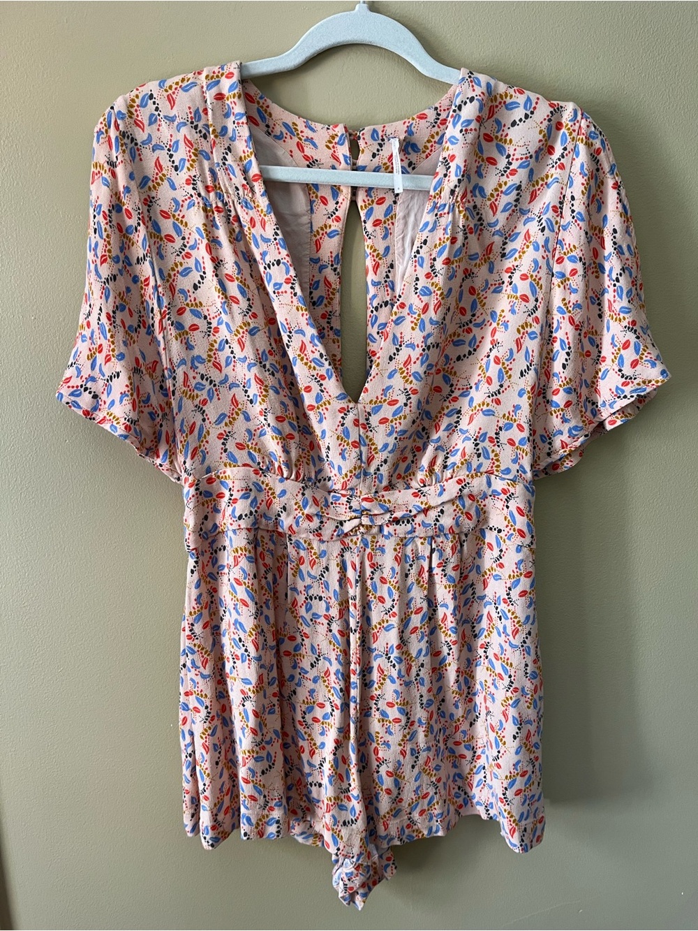Free People Blush Pink Floral Print Romper with Blue & Red Accents